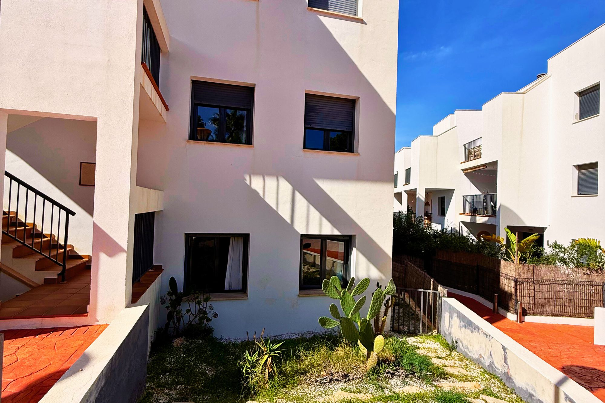 Resa Estates Ibiza Cala Tarida first line 3 bedrooms side exterior.jpg